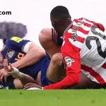 Newcastle’s Dan Burn Suffers Broken Rib and Punctured Lung in Derby Loss to Sunderland