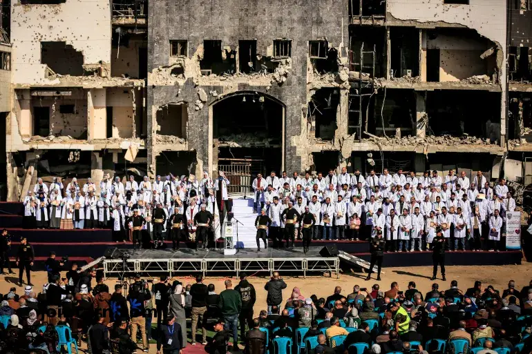 Palestinian Doctors Graduate Amid Ruins of Gaza’s Al-Shifa Hospital