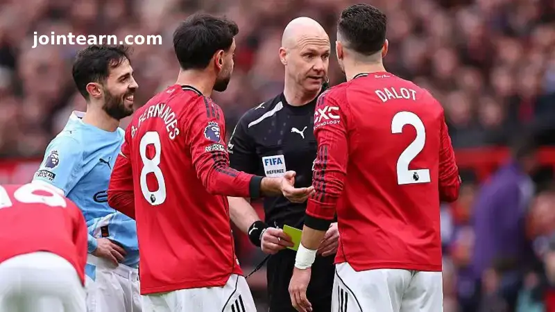 Refs’ Boss Howard Webb Defends Officials Over Diogo Dalot Yellow Card in Manchester Derby