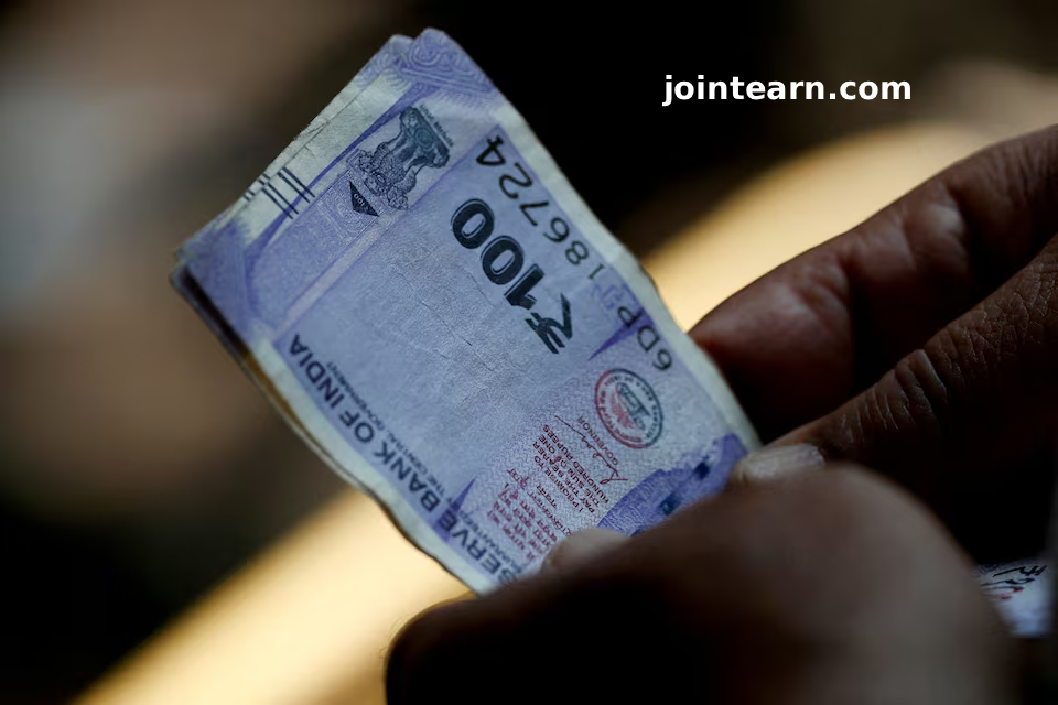 Indian Rupee Declines Amid Tariff Concerns and Capital Outflows, RBI Intervention Offers Limited Relief