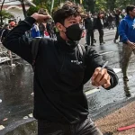 Indonesia Protests Erupt After Death of Ride-Sharing Driver Hit by Police Vehicle